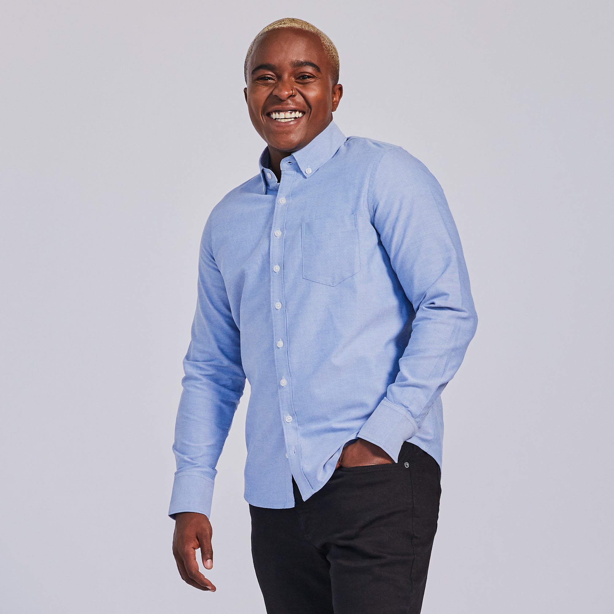 Women's button down Oxford shirt in blue. Color: Blue