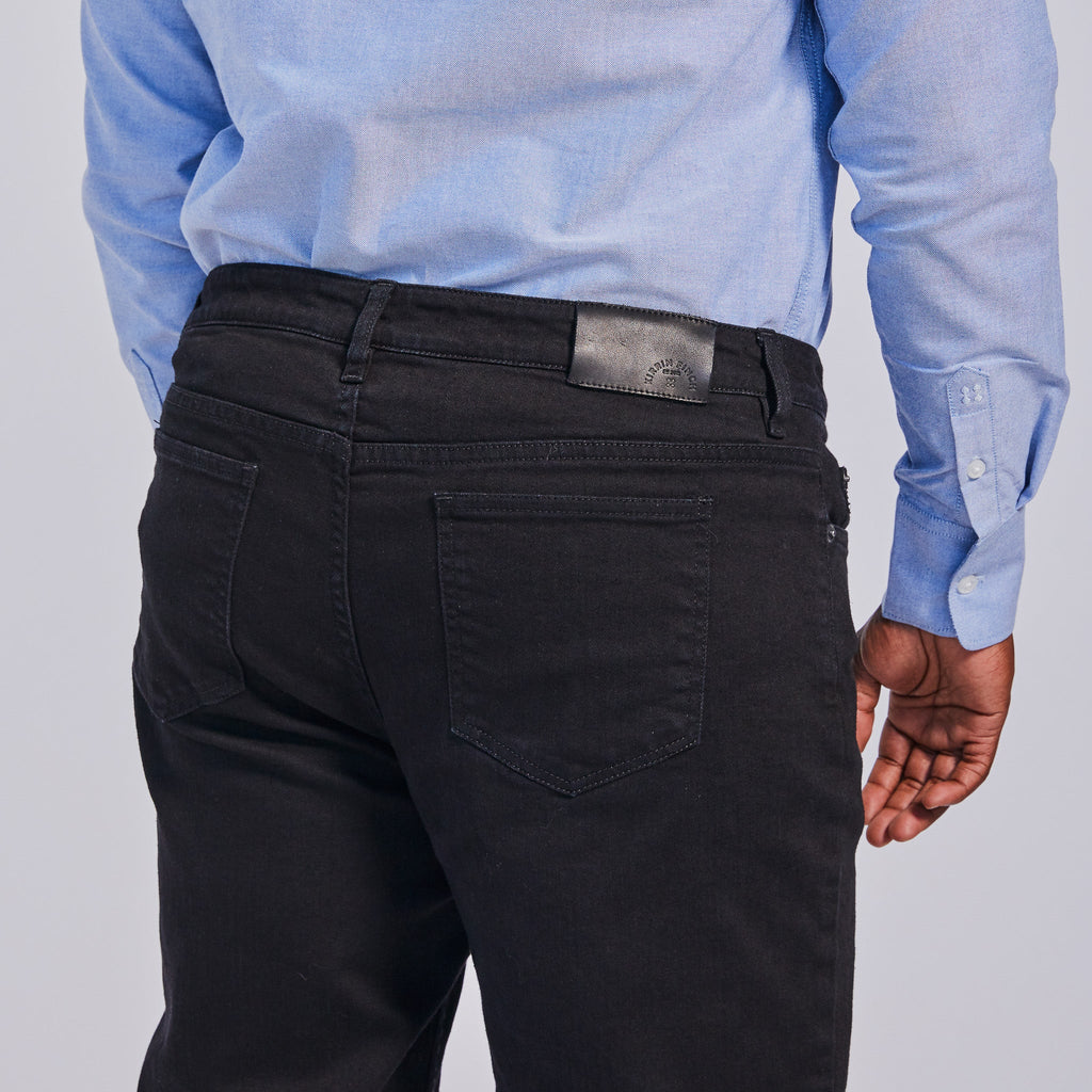 Back pockets of Joni Black Jeans. Color: Black