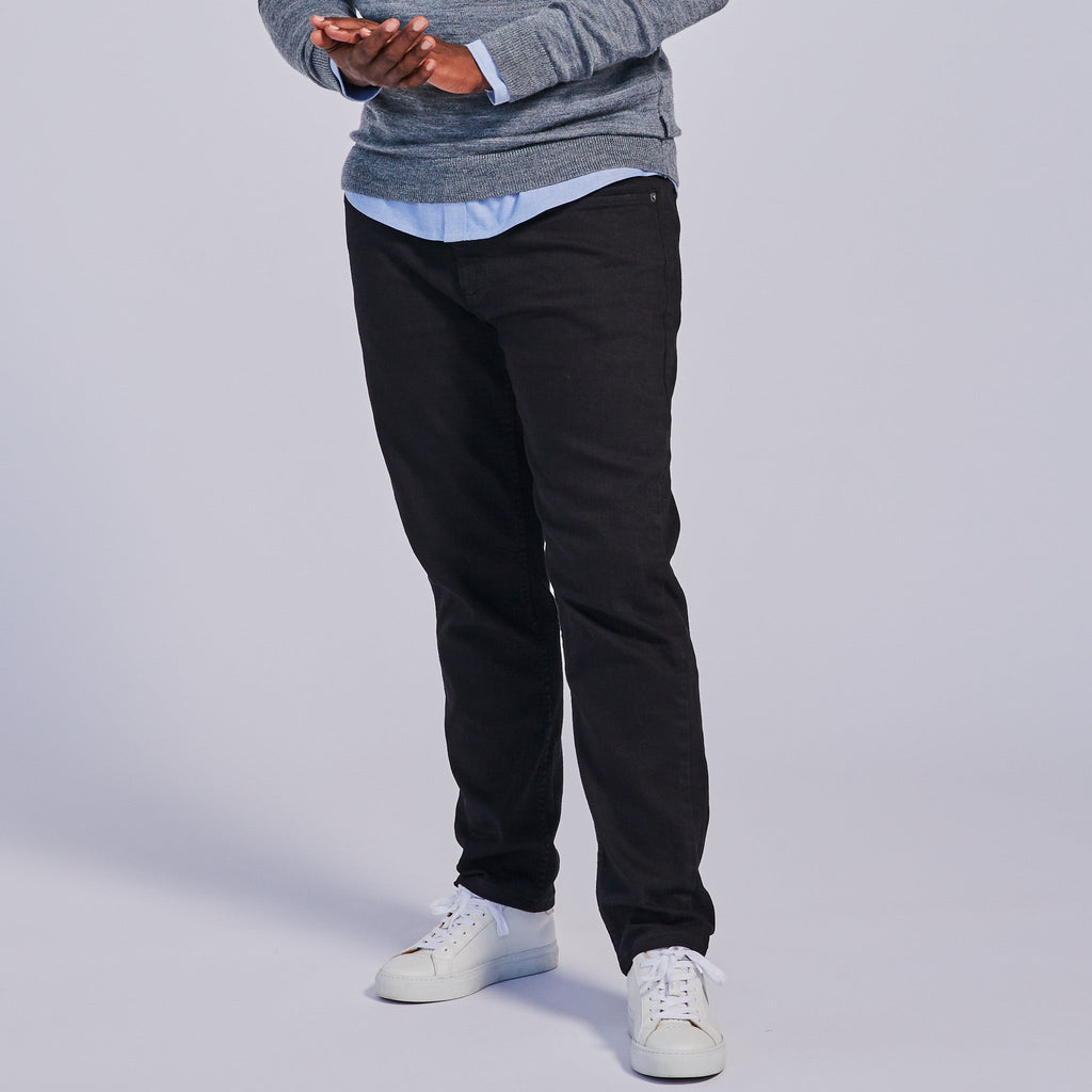 The Joni Jeans slim tapered black jeans by kirrin finch. Color: Black