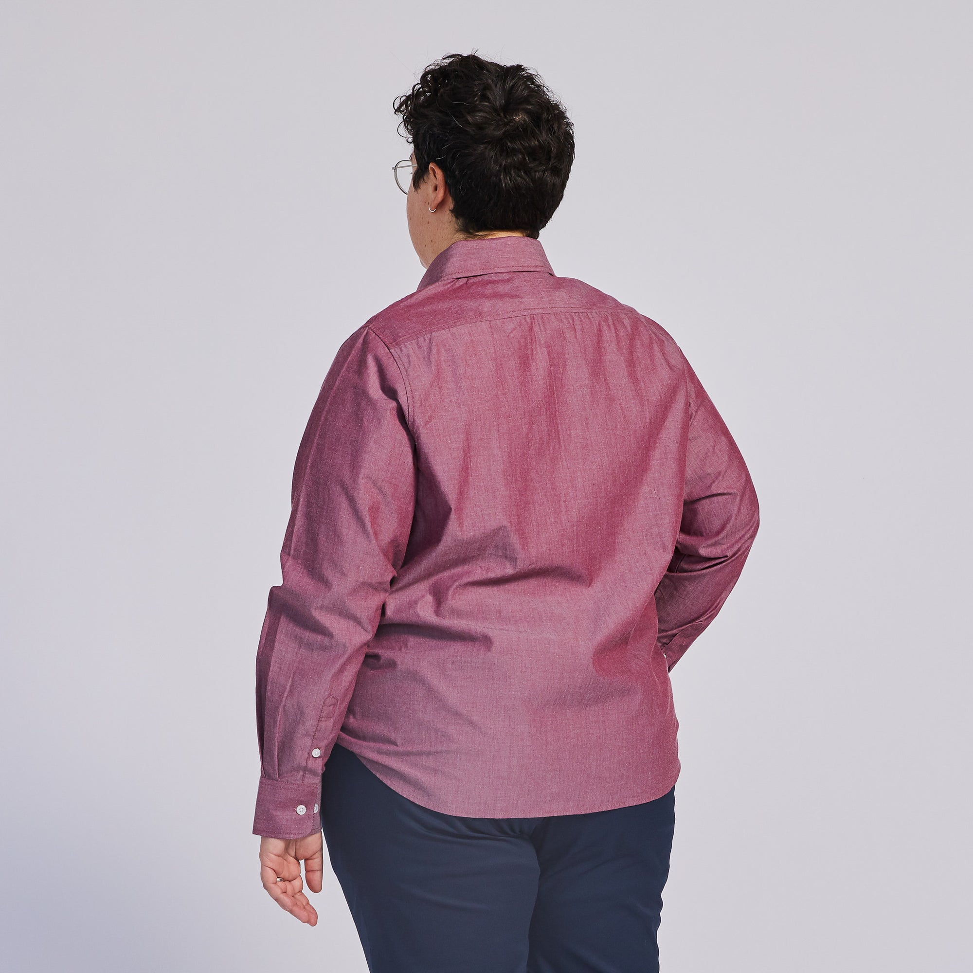 Clean back of the red chambray point collar shirt. Color: Red Chambray
