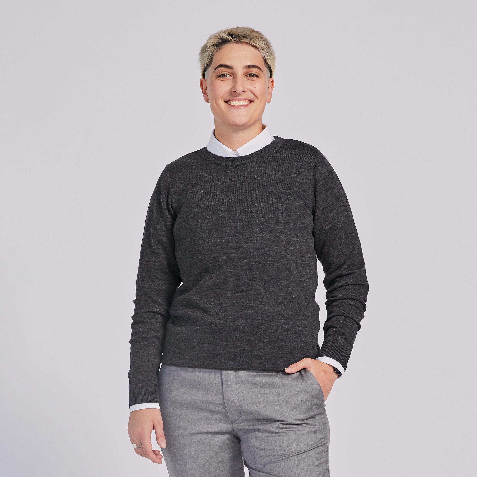 Masc Model in charcoal wool sweater. Color: Charcoal