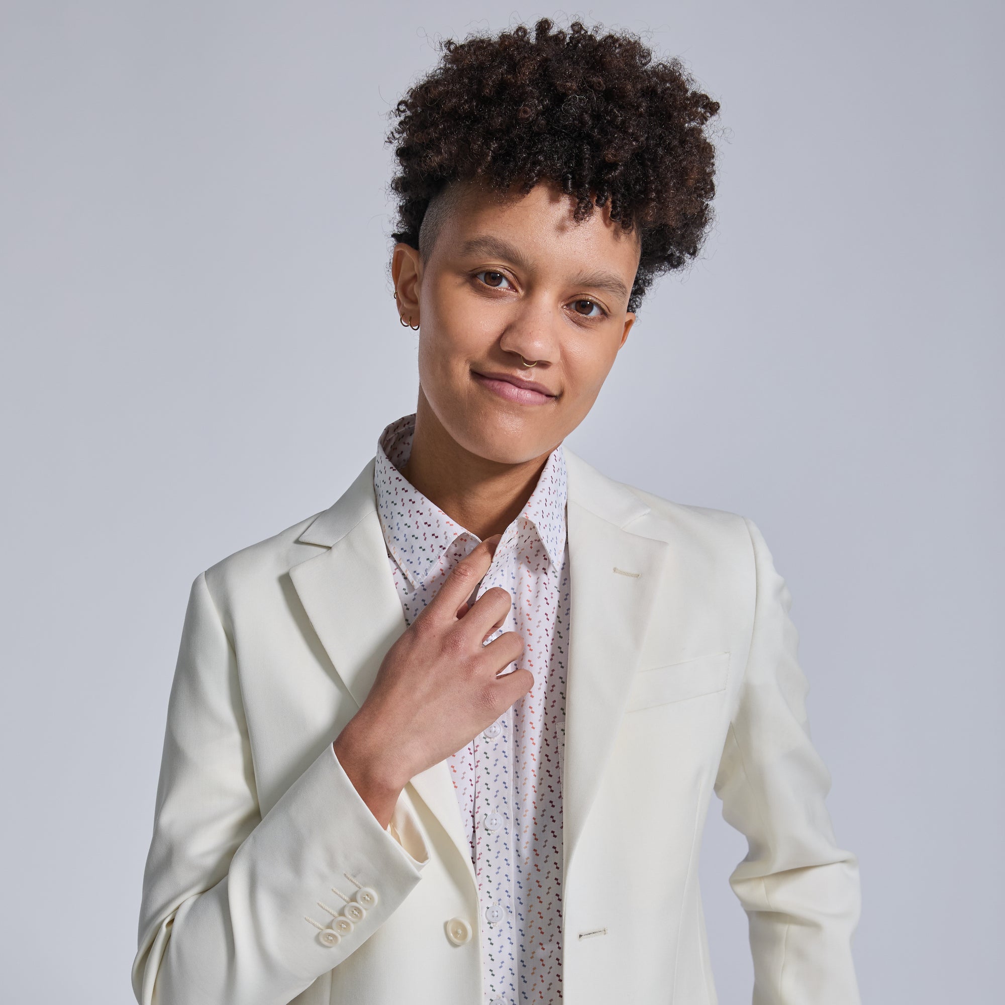 All white wedding suit with confetti short sleeve shirt for women, trans, masc, and non-binary folk. Color: Ivory