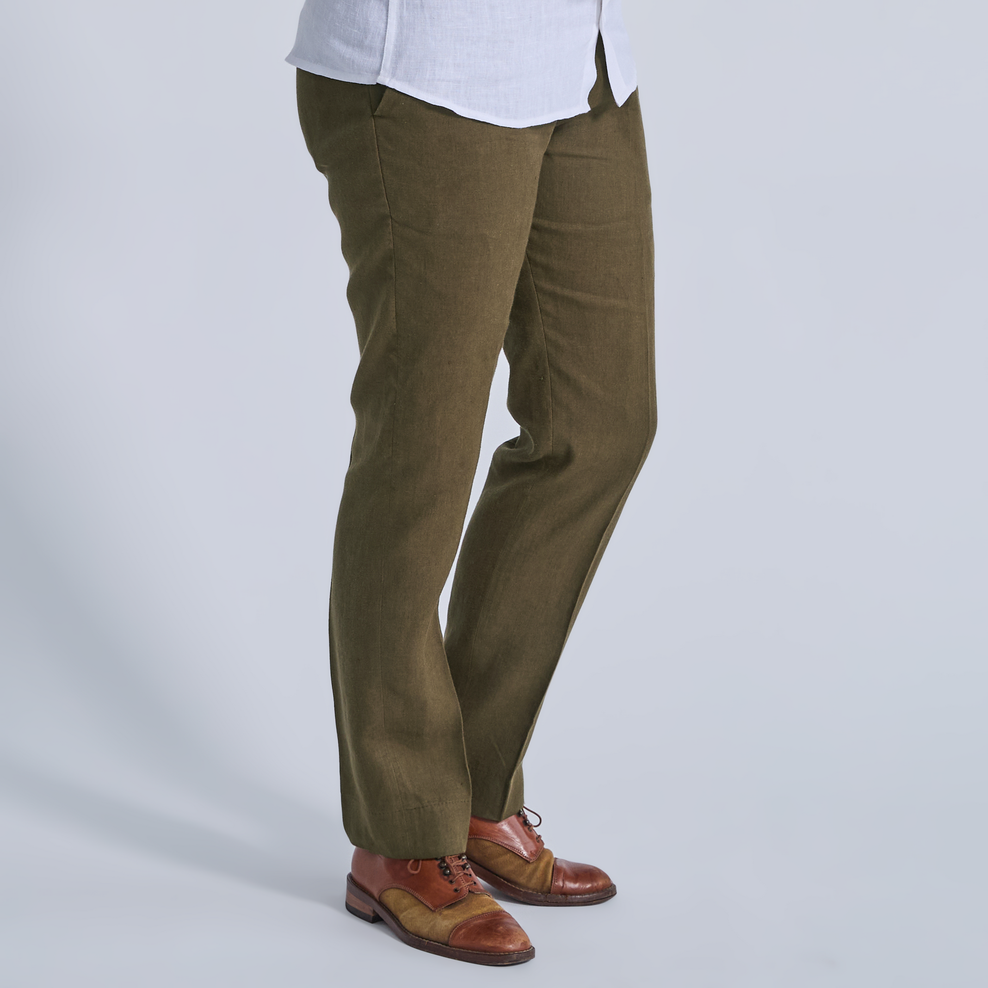 Deep moss linen dress pants for women, trans, masc, and non-binary folk. Color: Deep Moss