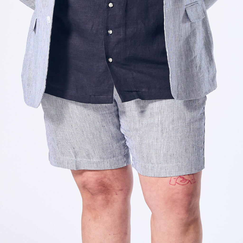 Blue stripe linen shorts made for women, trans, masc, and non-binary folk. Color: Hampton Blue Striped