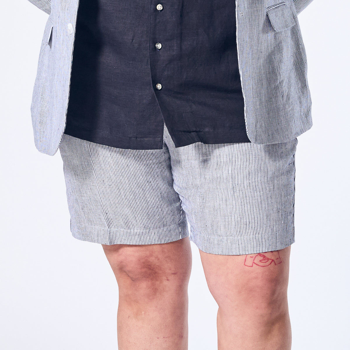Blue stripe linen shorts made for women, trans, masc, and non-binary folk. Color: Hampton Blue Striped