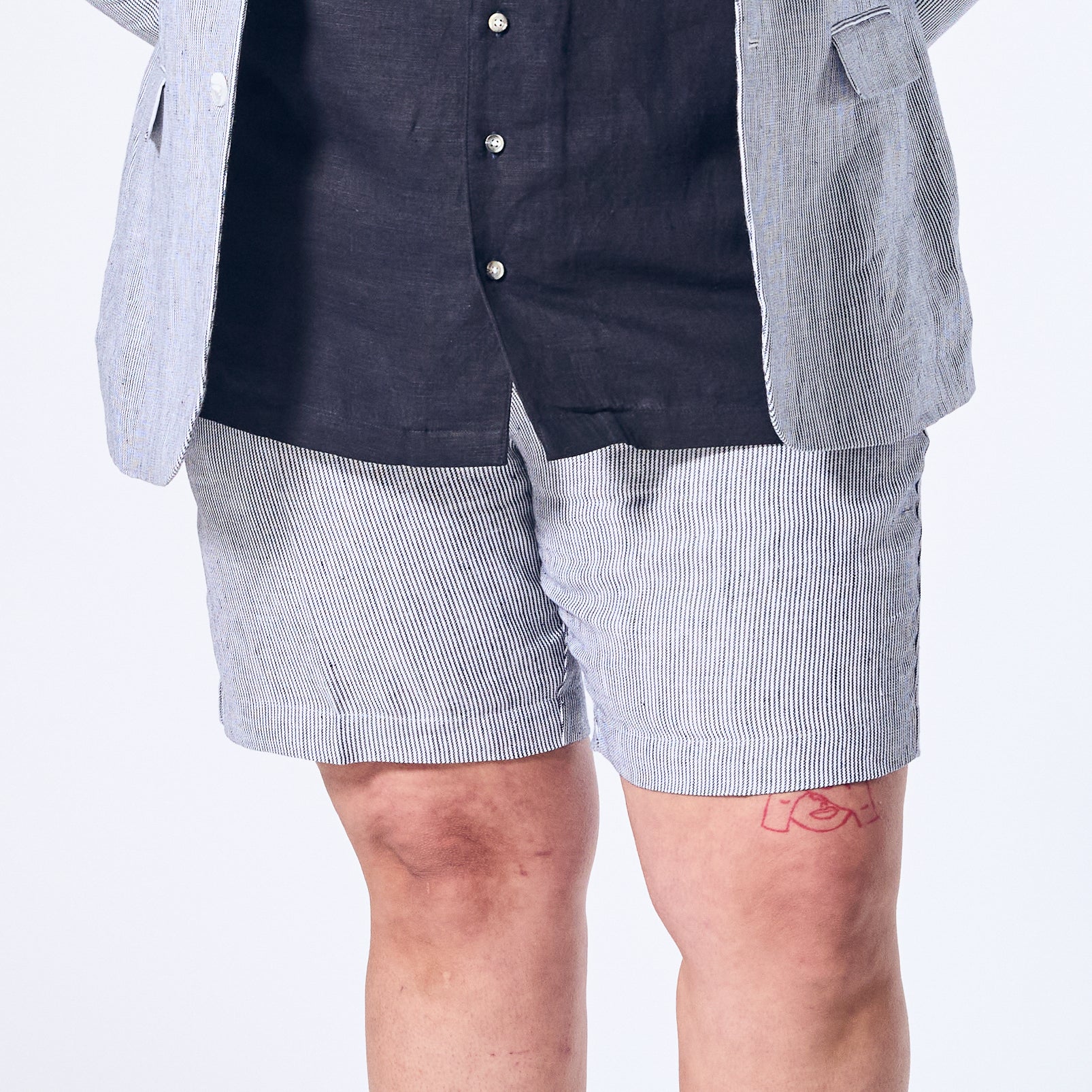 Blue stripe linen shorts made for women, trans, masc, and non-binary folk. Color: Hampton Blue Striped