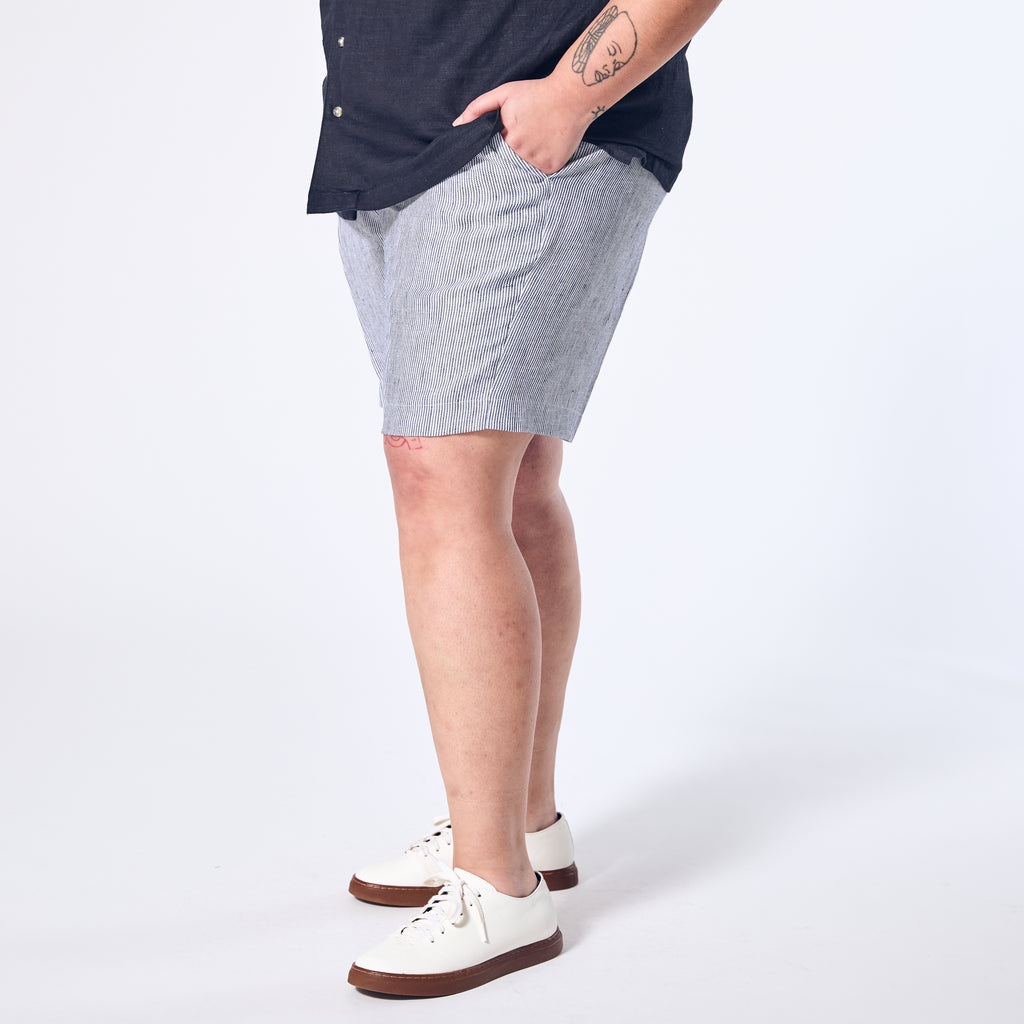 Blue stripe linen shorts featuring deep pockets.  Color: Hampton Blue Striped