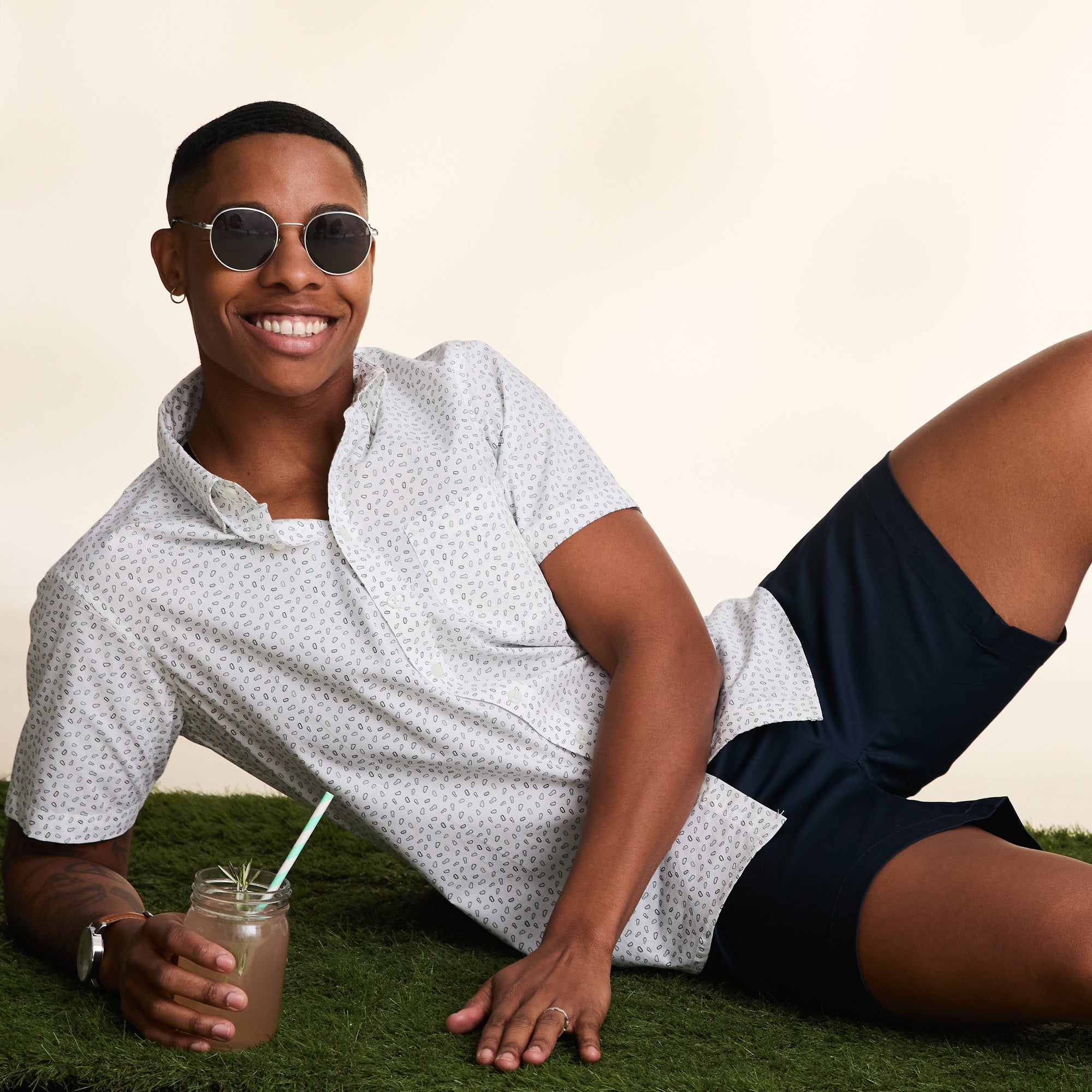 Androgynous short sleeve button down with mini carabiner print.  Color: Carabiner