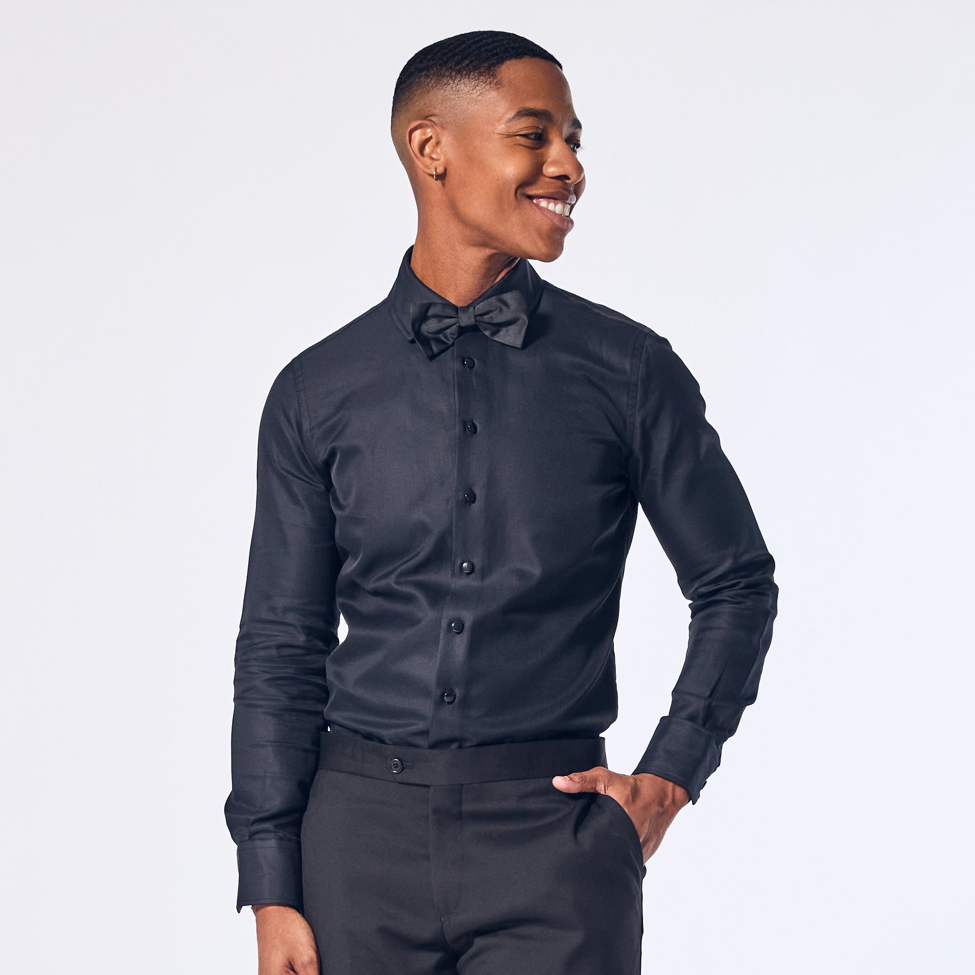 The Kirrin Jet Black Tuxedo Shirt paired with black bow tie by Kirrin Finch. Color: Jet Black