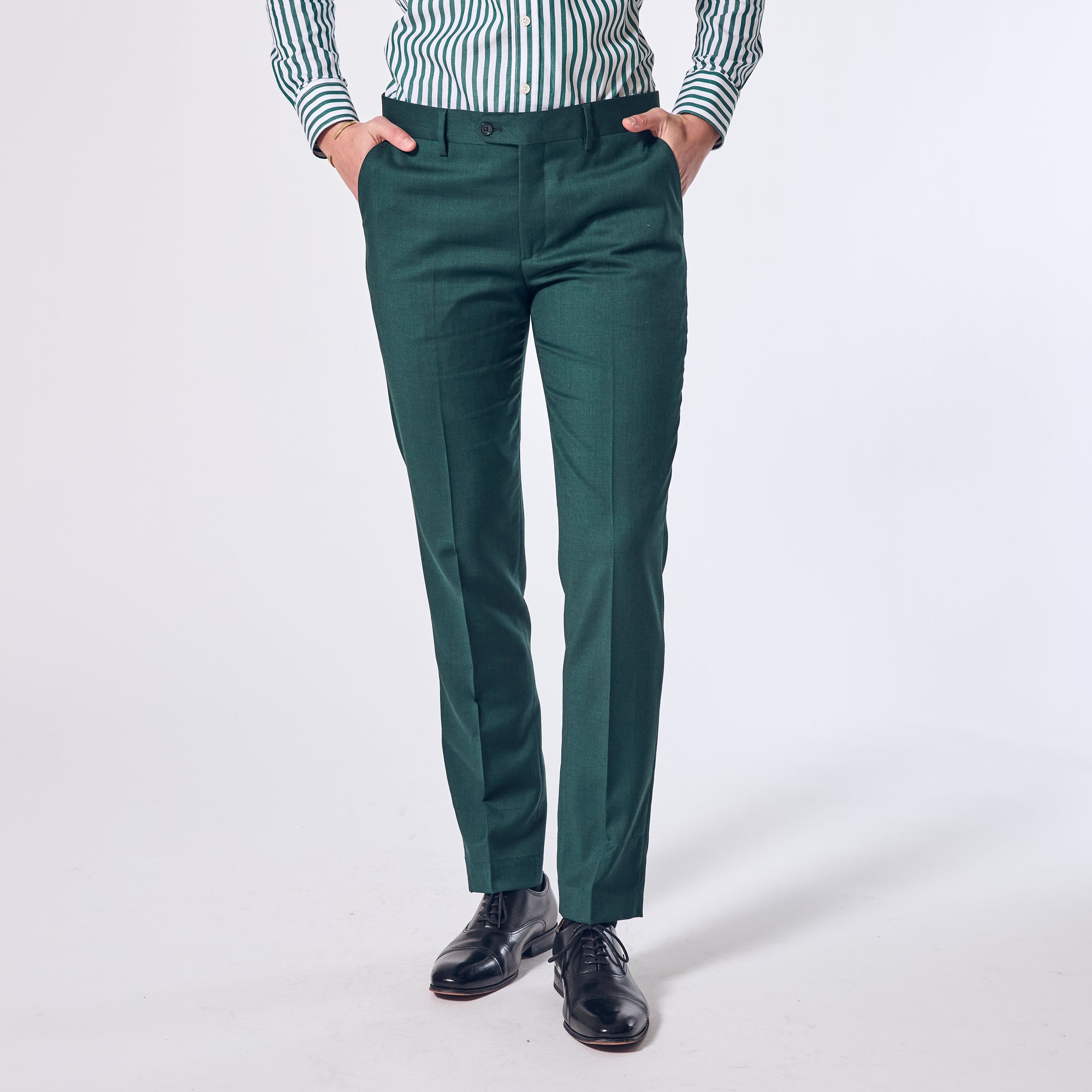 Androgynous emerald green dress pants made for women, trans, and non-binary folks. Color: Emerald