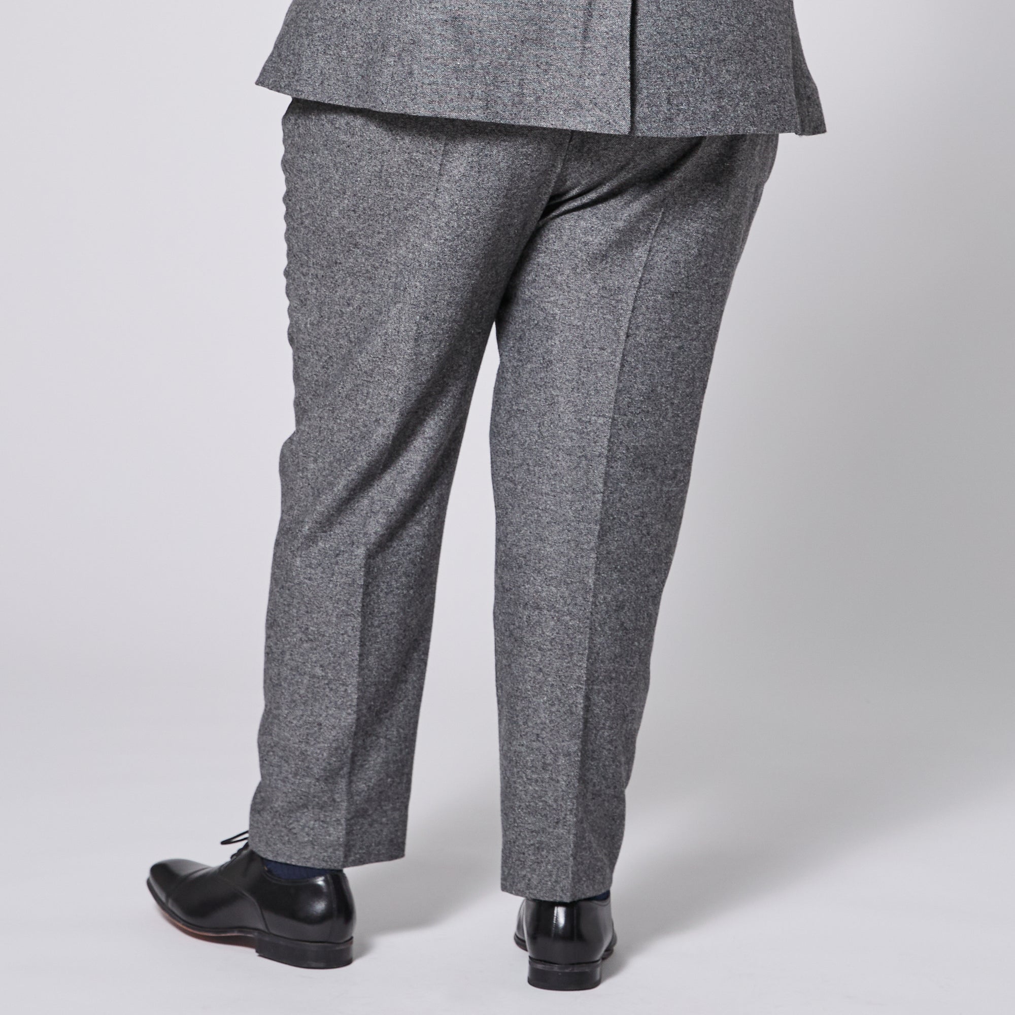 The Finch Smokey dress pants.  Made for women, trans, masc and non-binary folks. Color: Smokey