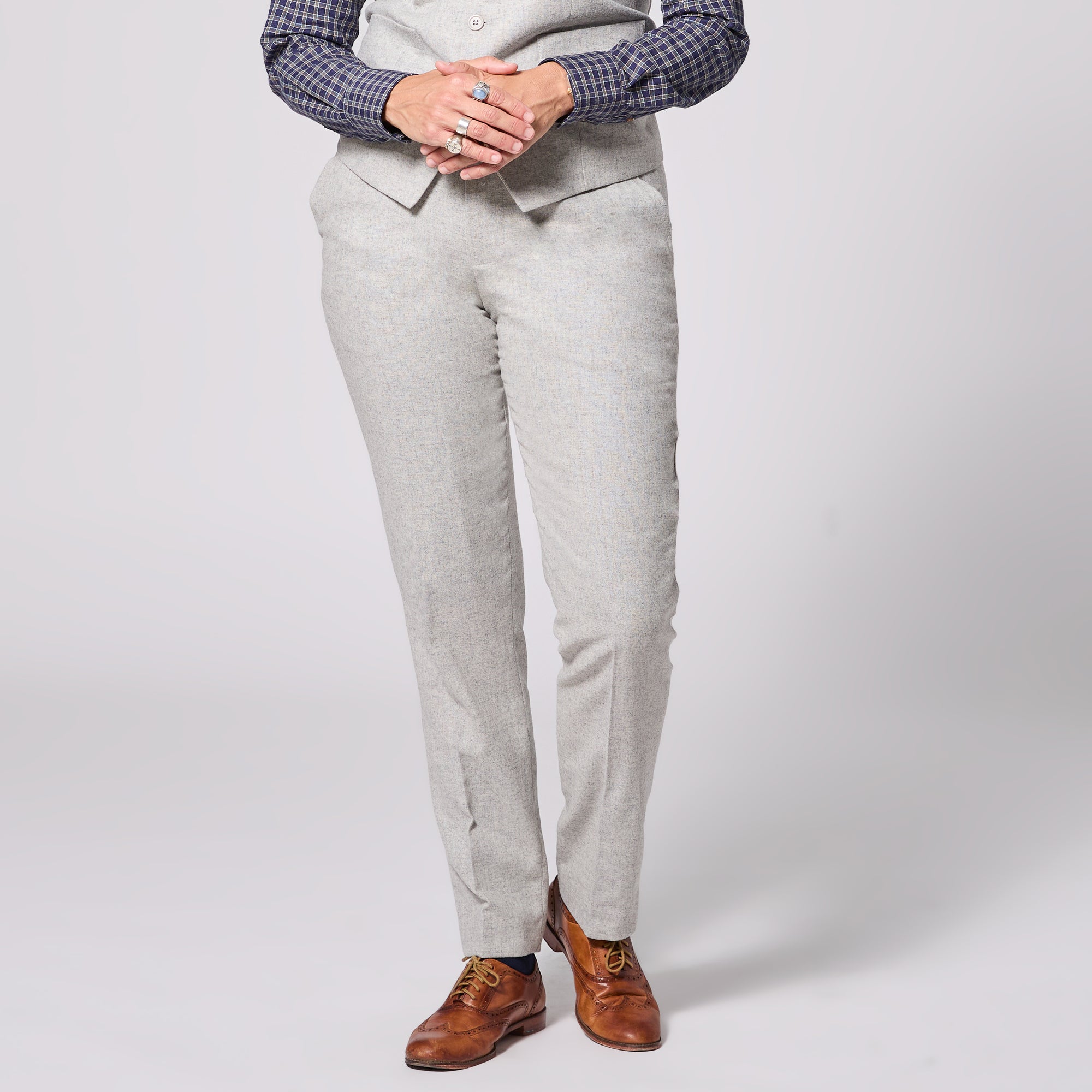 Model wearing The Finch Heather Gray Flannel Dress Pants made by Kirrin Finch. Color: Heather Gray Flannel