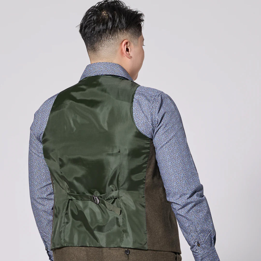 The Finch Heather olive flannel vest with adjustable back clasp. Color: Heather Olive Flannel