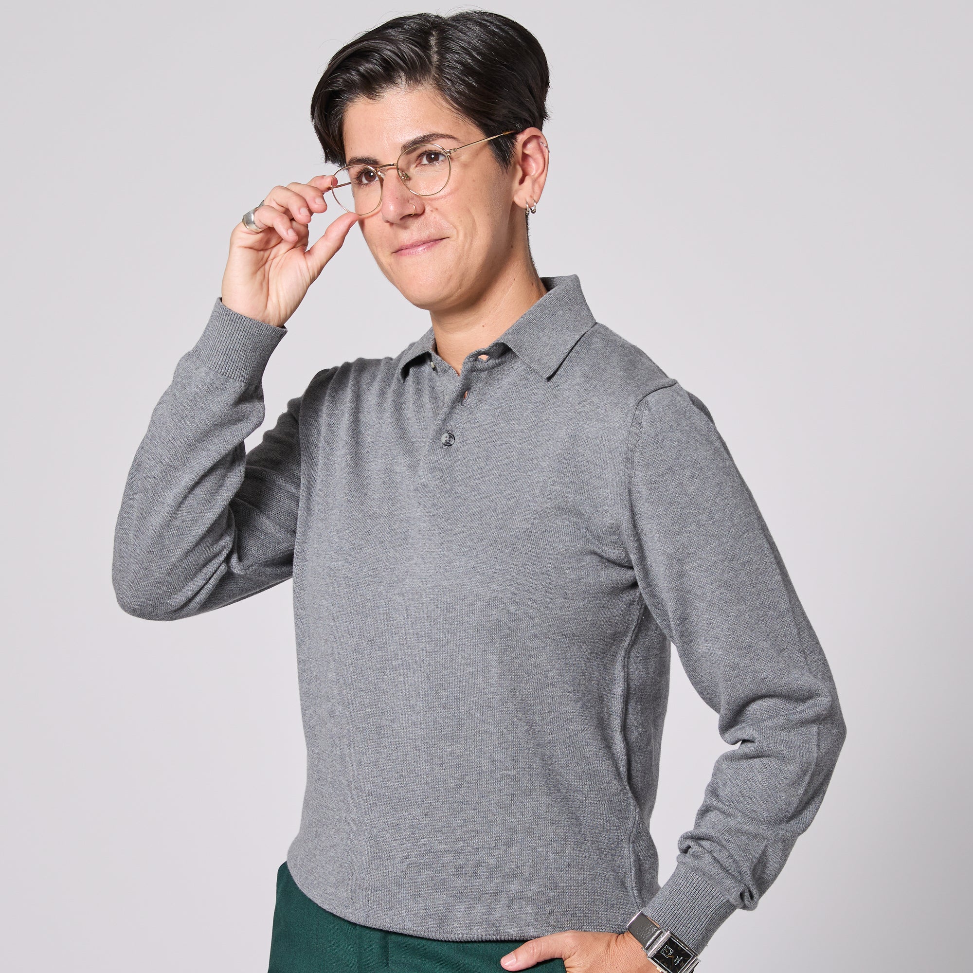 Gray long sleeve polo sweater with Jersey knit texture. Color: Gray Heather 
