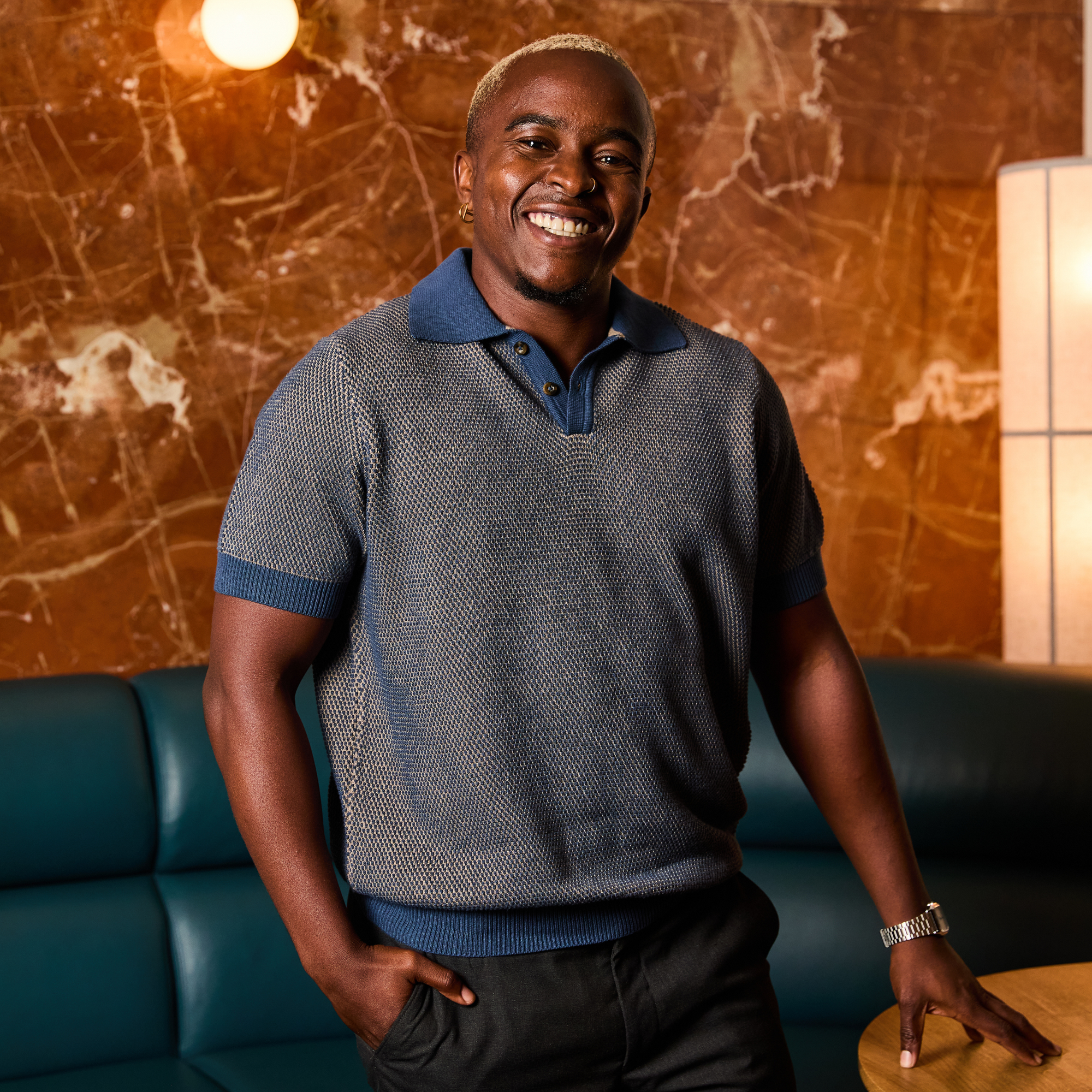 The denim and beige pique polo made for women, trans, and non-binary folks. Color: Dusty Harbor