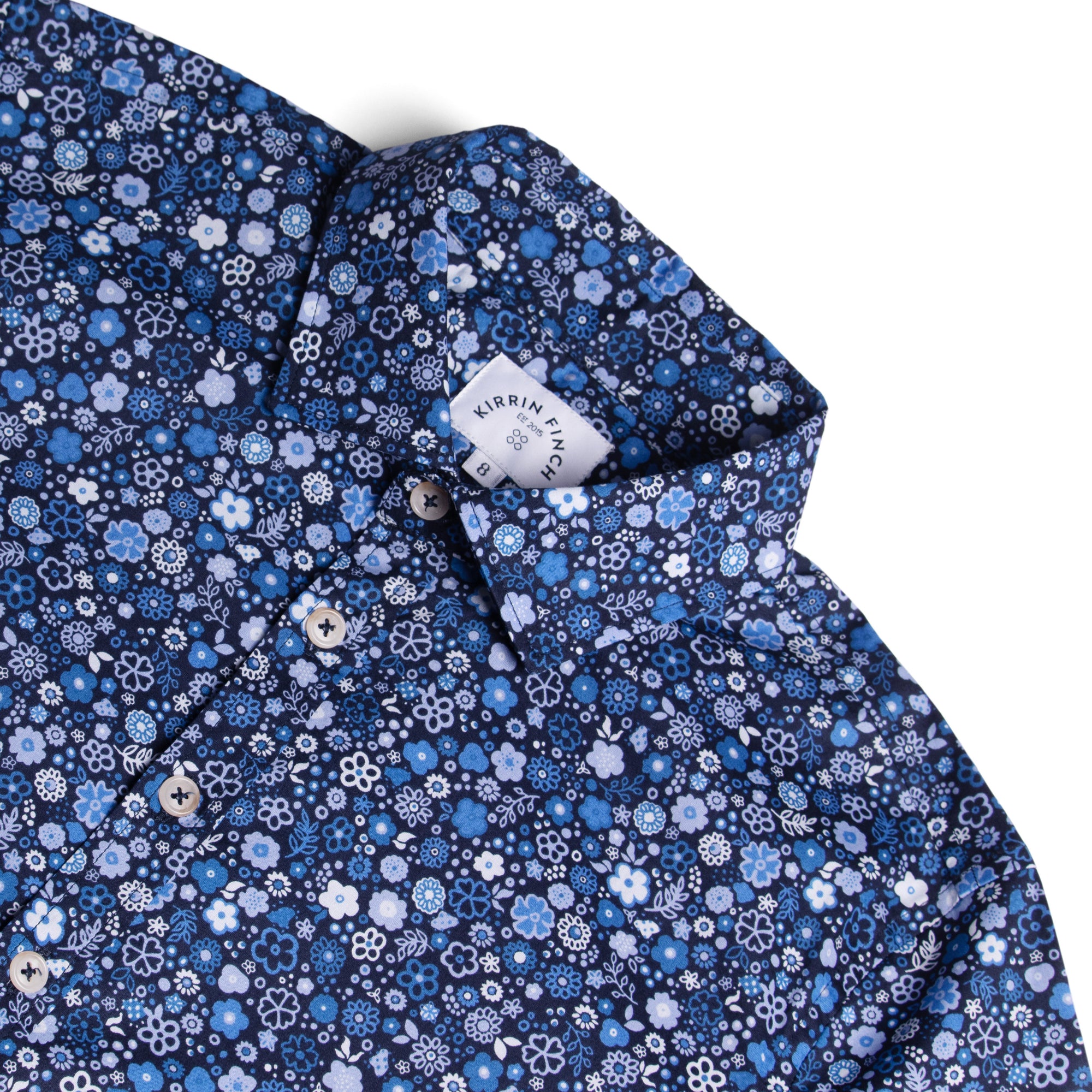 Womens blue floral patterned shirt. Color: Floral Fête