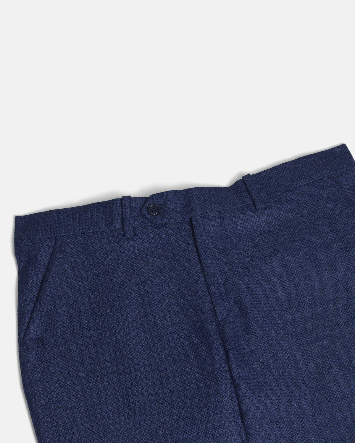 Navy blue pants on a light gray background. Color: Navy Textured
