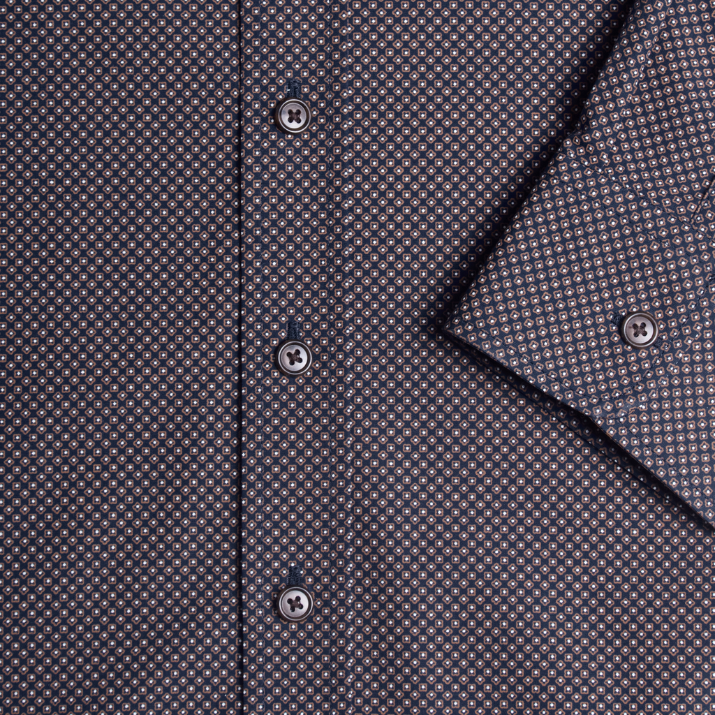 Close-up of a patterned shirt with buttons and collar. Color: Moroccan Tile