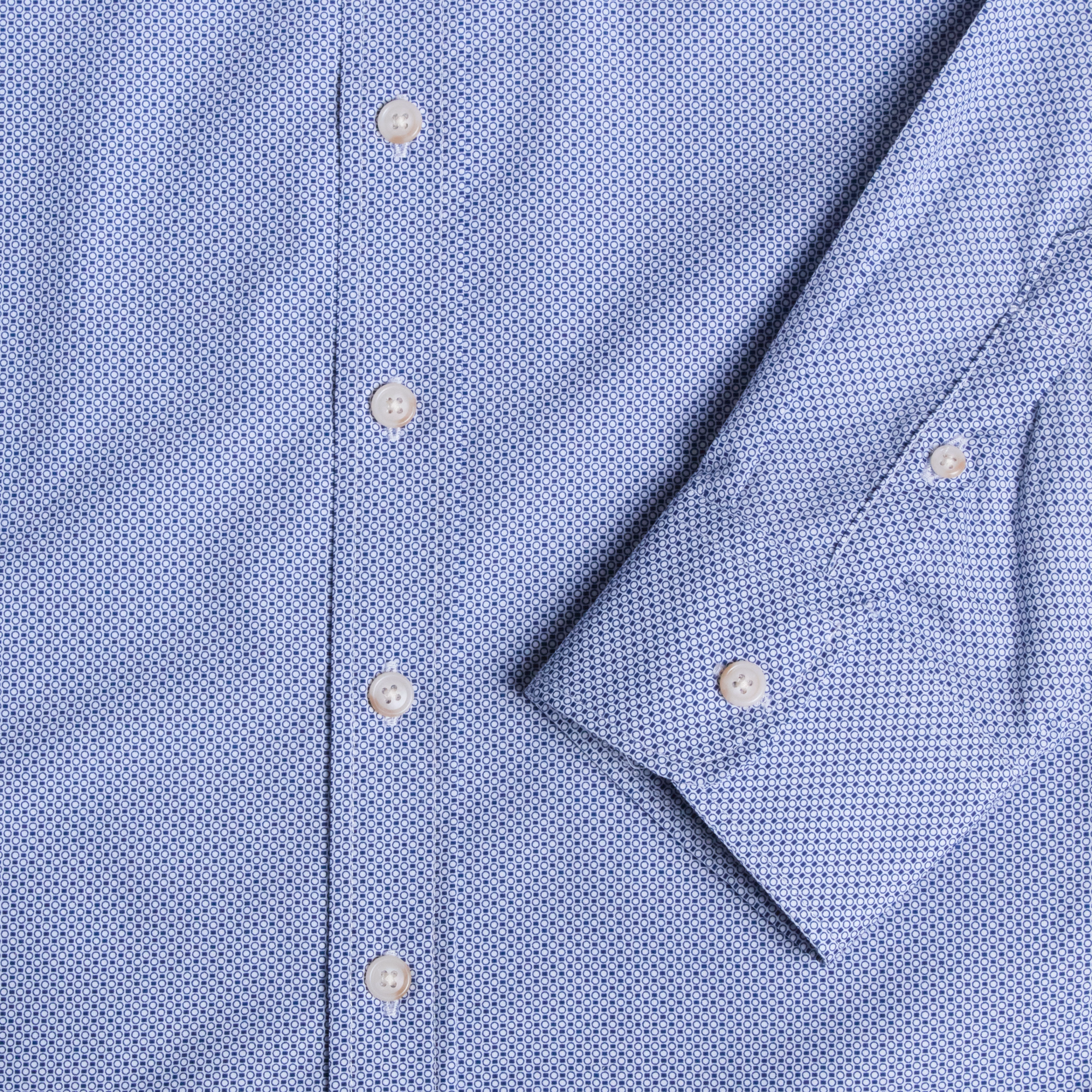 Close-up of a blue patterned shirt showcasing front and sleeve cuff buttons. Color: Morse Code