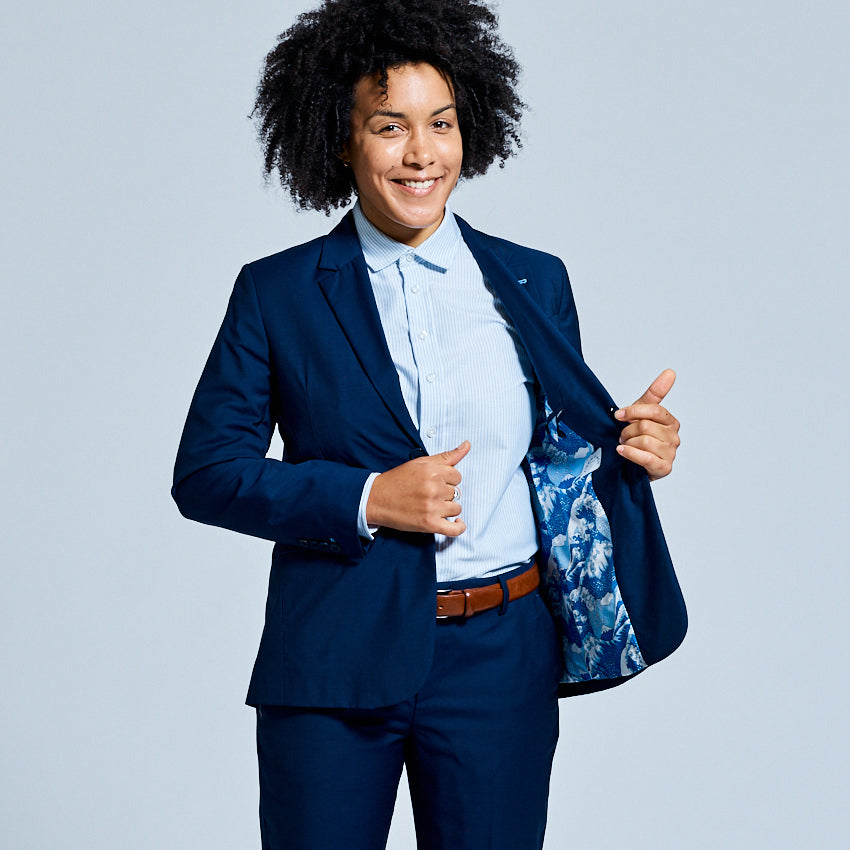 Woman in navy blue suit by kirrin finch. Color: Navy