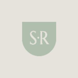 Green crest with 'S-R' initials on a light gray background