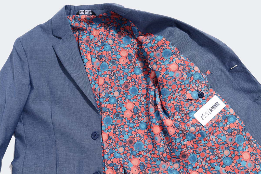 Closeup of the Interior lining of the slate blue Georgie blazer. Color: Slate Blue