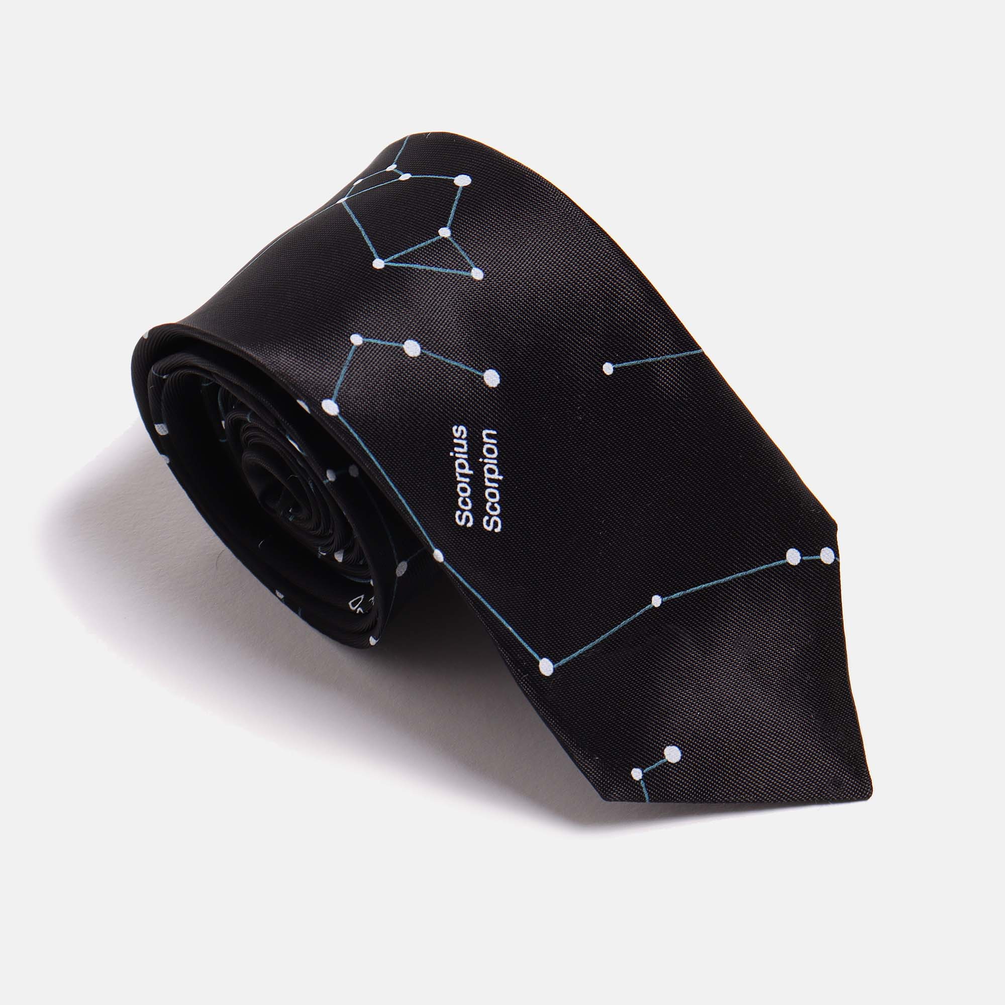 Black Skinny Tie with a constellation print by Kirrin Finch. Shown at a 3/4 angle on a white background. Color: Black Constellation 