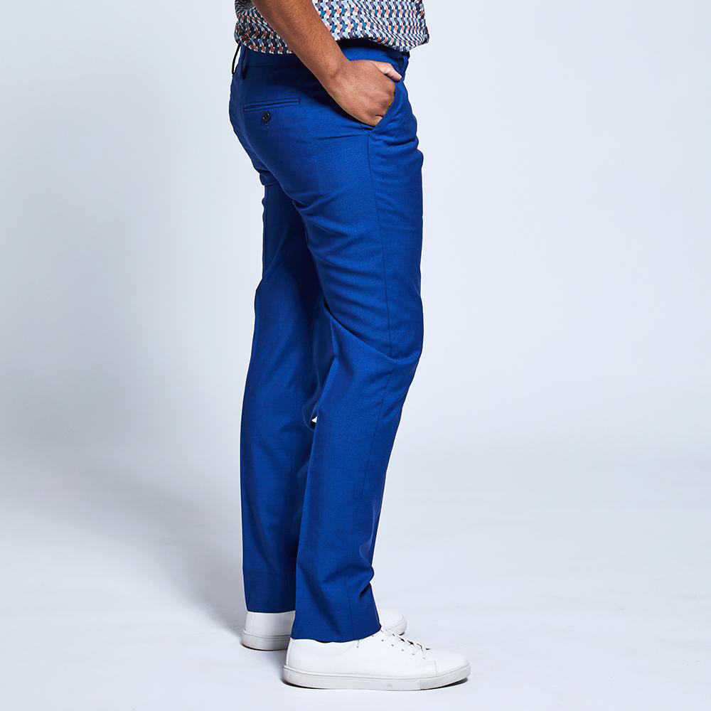 Women's royal blue dress pants with dark blue buttons. Color: Royal Blue