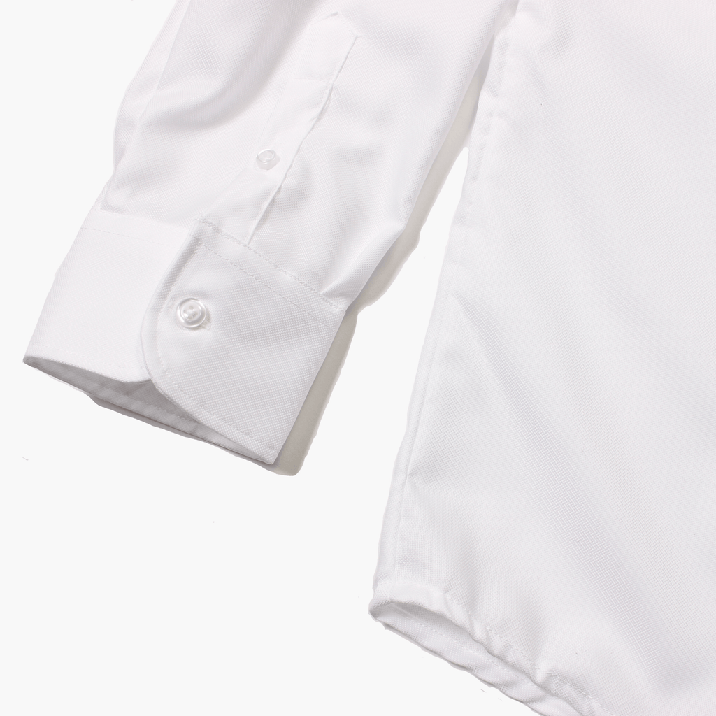 Sleeve and texture details of White Easy Care Dress Shirt by Kirrin Finch. Color: White