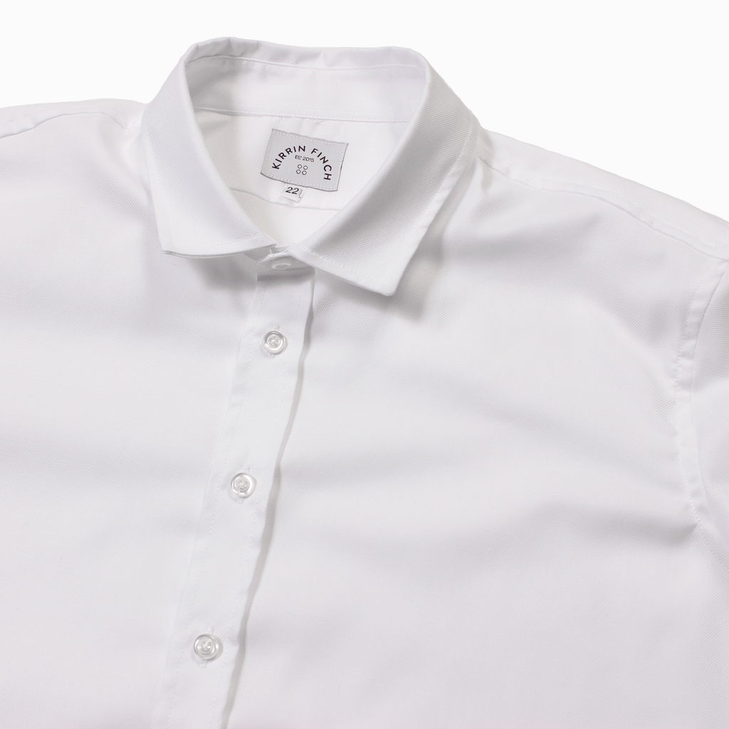 Women's White Dress shirt with white buttons. Color: White